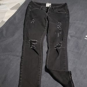 Black distressed skinny jeans